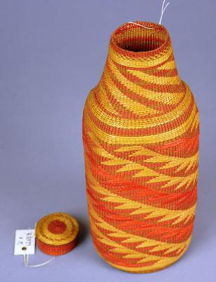 Bottle with lid (root weave)