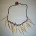 Neck cord for shaman with amulets