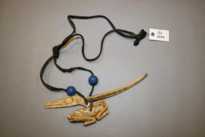 Neck cord for shaman with amulets