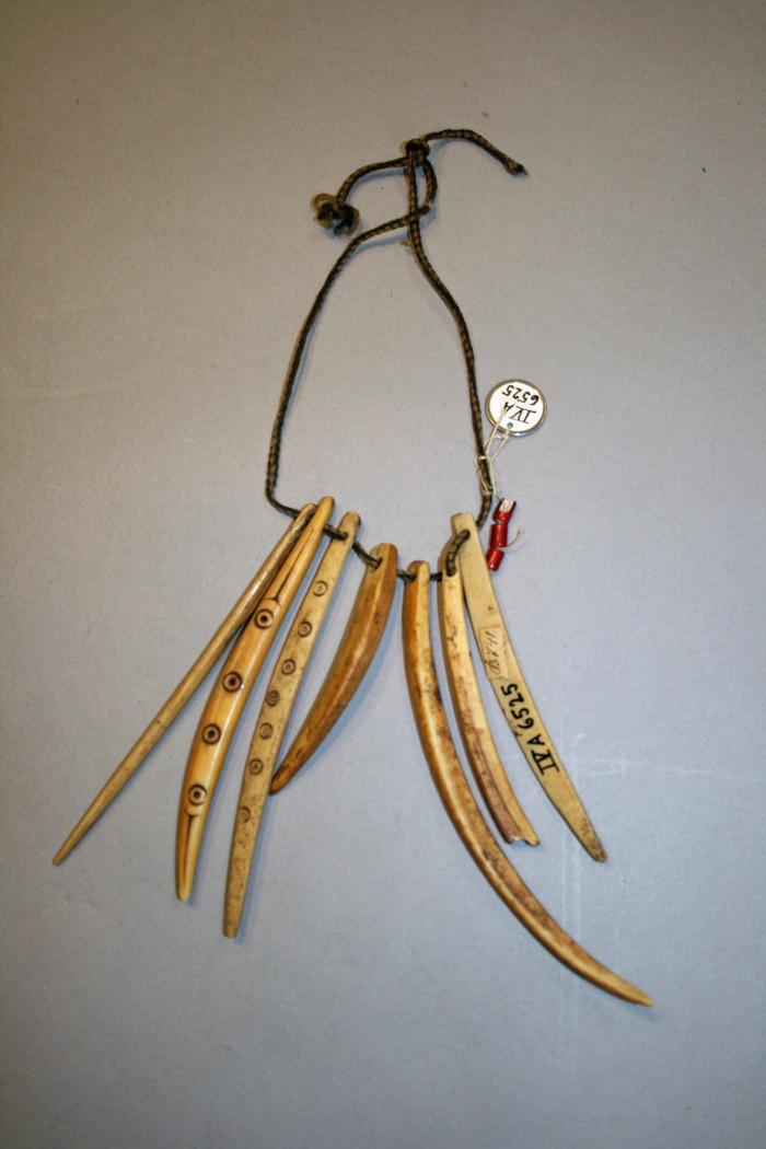 Neck cord for shamans with amulets
