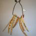 Neck cord for shamans with amulets