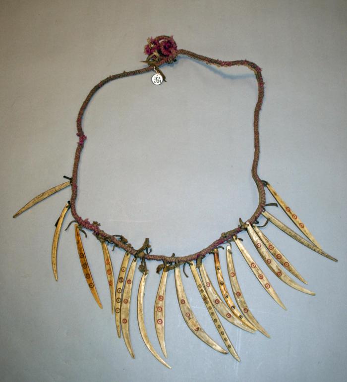 Neck cord for shaman with amulets